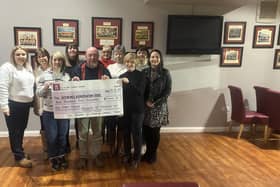 Colin Bell from the Kevin Bell Repatriation Trust is pictured alongside Caroline Cromie's friends who helped to organise the recent charity effort. (Pic: Contributed).