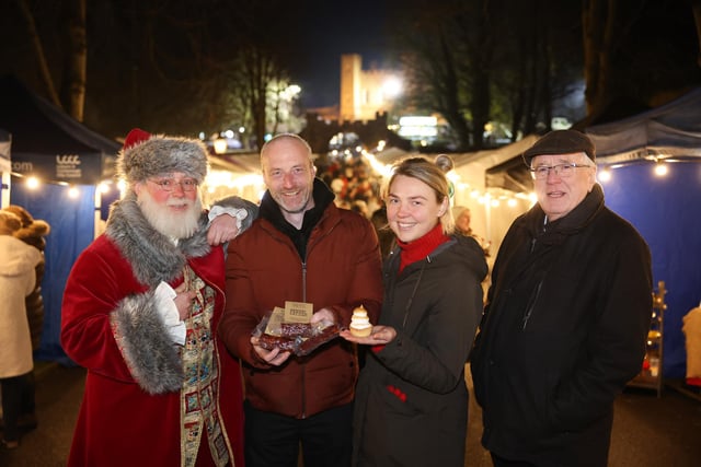 Pictured at the market are Santa; Jonny Cuddy (Ispini), Maija Irvine (Kin and Folk) with Alderman Allan Ewart MBE, Development Committee Chairman.