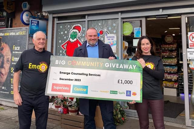 John Lynn and Ciara McCullough from Emerge Counselling with Ricky Leathem, owner of Centra Longstone Street (centre) who presents the group with a donation of £1,000 from SuperValu and Centra’s £40K Big Community Giveaway. Pic credit: Musgrave Northern Ireland
