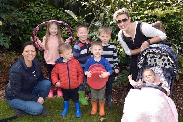 The Courtney and Alexander families enjoying the Easter Trail and Fun Day at Tannaghmore Gardens on Thursday. PT15-207.