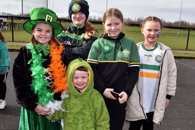 Enjoying the St Paul's GAC St Pats day parade are from left, Caoimhe Mallon (9), Maeve Mallon (13), Senann Mallon (3), Eimear Mallon (12) and Elsie Matin (8). LM12-207.