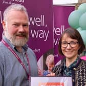 ​Owners, Declan O’Duil and Una O’Duil, standing proudly with their WorkBuzz certificate.