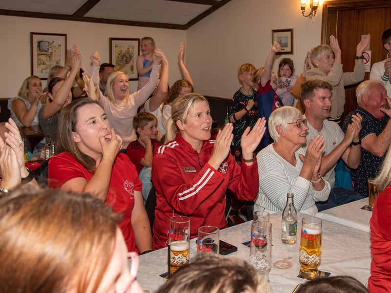 Fans at the Daniel Wiffen watch party cheer on the local lad who was competing in the Olympic 1500m Freestyle swimming final. LM32-213.