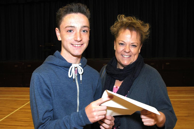 Ryan McCrory and his mum, Kerrie were all smiles with his GCSE results at Downshire School in 2014.  Ryan obtained 2As, 4Bs and 2C grades.  INCT 36-206-AM