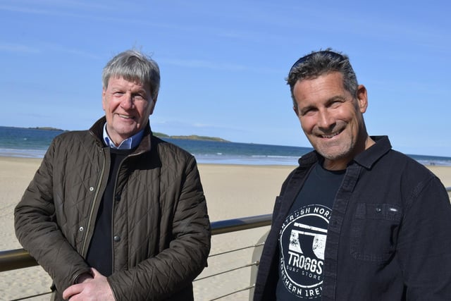 Joe Mahon With surfer Andy Hill at Portrush East Strand