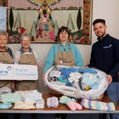 Pictured L-R are Baby Basics volunteers Joy Moore and Meredith Hewitt, Baby Basics Ballymena centre leader Shirley Mann, and Power NI representative Barry Rogan.  Photo: Brendan Gallagher