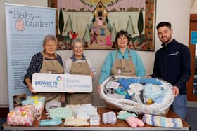 Pictured L-R are Baby Basics volunteers Joy Moore and Meredith Hewitt, Baby Basics Ballymena centre leader Shirley Mann, and Power NI representative Barry Rogan.  Photo: Brendan Gallagher
