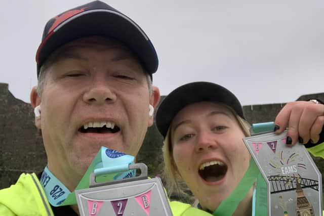 Stephen McLoughlin pictured after the New Year’s Eve Half Marathon with his daughter Gemma who ran the 10k at the same time.