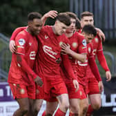 Alberto Balde (left) celebrating with team-mates during Portadown's win over Newry City