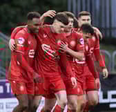 Alberto Balde (left) celebrating with team-mates during Portadown's win over Newry City