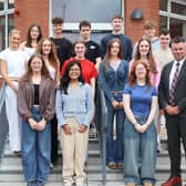 All smiles from 2 A Star A Grades students at Rainey Endowed School, Magherafelt, pictured with Headmaster Mr Mark McCullough.