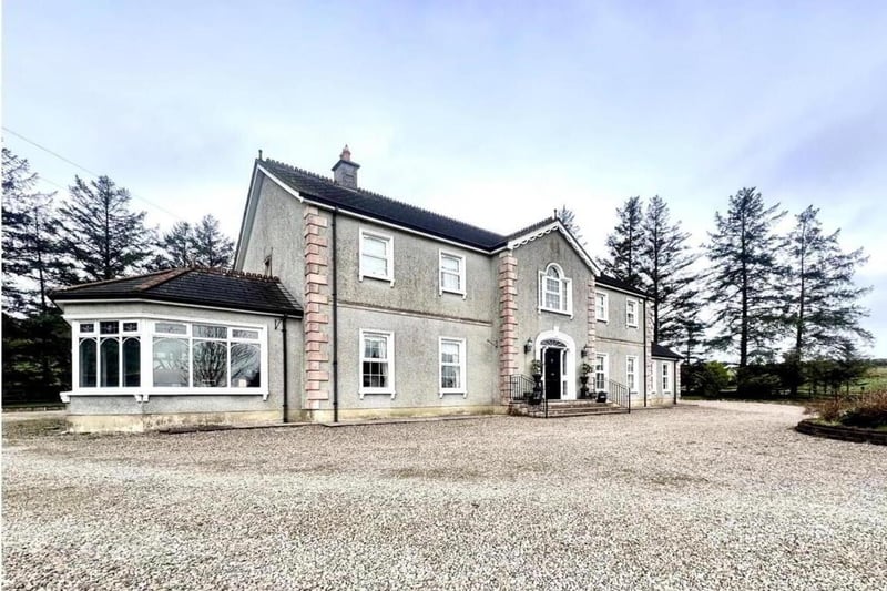 The detached double-fronted Georgian family residence.