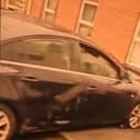 Damaged car at a house in Grattan Street, Lurgan, Co Armagh following a PSNI car chase.