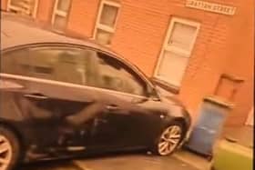 Damaged car at a house in Grattan Street, Lurgan, Co Armagh following a PSNI car chase.