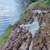 A damaged walkway  at Woodburn Upper beside the waterway. Photo issued by NI Water