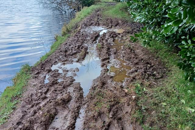 A damaged walkway  at Woodburn Upper beside the waterway. Photo issued by NI Water