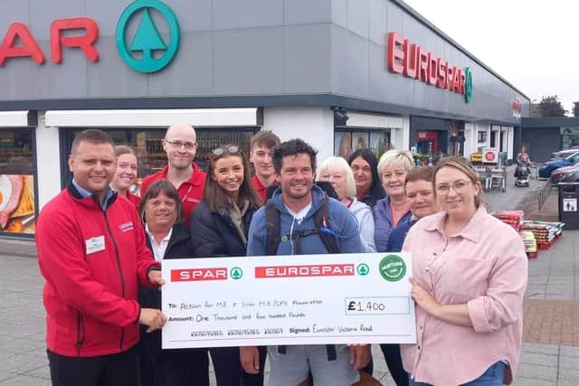 Peter Nesbitt, assistant manager; Leigh Mulligan, team leader, and the Eurospar Victoria Road team presenting Lee with their cheque for Action for M.E and Irish ME/CFS Association. Photo submitted