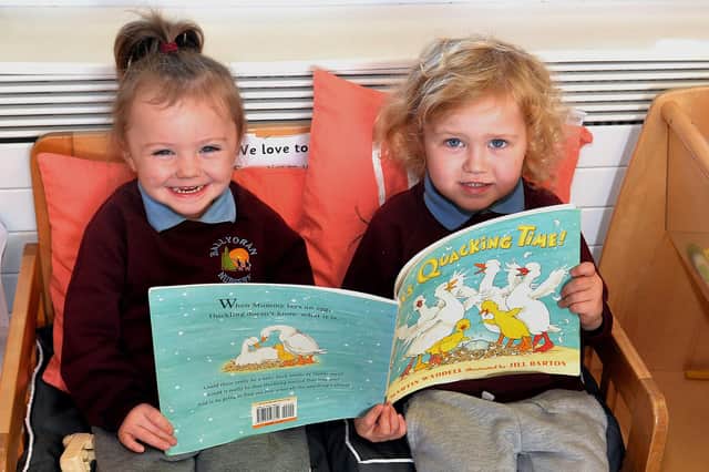 Enjoying a book together in Ballyoran Primary School Nursery Unit are pupils, Ella Rose , left, and Teddy. PT42-327.