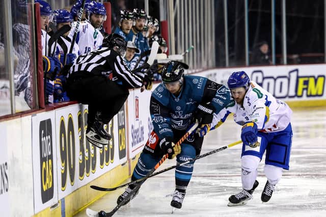 Belfast Giants' Gabe Bast with Fife Flyers' Bari McKenzie during a Challenge Cup game at the SSE Arena, Belfast.  Picture by William Cherry/Presseye