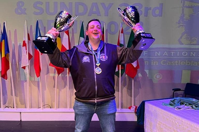 On top of the world: Johnny McKinley with two trophies as Lurgan Coarse Angling Club wins the World Club Feeder Championships in Muckno, Castleblayney, Co Monaghan at the weekend.