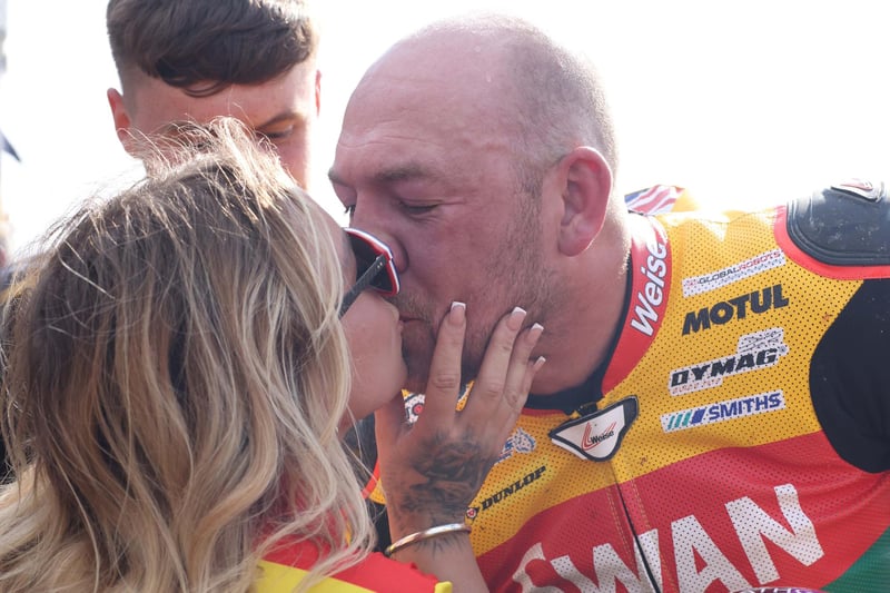 Peter Hickman gets a kiss from girlfriend Fifi after winning his second Supertwin win of the afternoon.