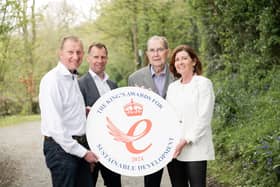 David Henry, Ian Henry, Jim Henry, and Julie McKeown celebrating the announcement that Henry Brothers has been honoured with a King’s Award for Enterprise for Sustainable Development. Pictured: Henry Brothers