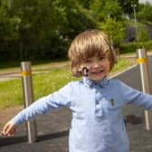 Four-year-old Caiden is all smiles ahead of this year’s Coalisland Summer bash as it returns to a new venue at the Shared Space, Lineside in Coalisland on Sunday May 28.