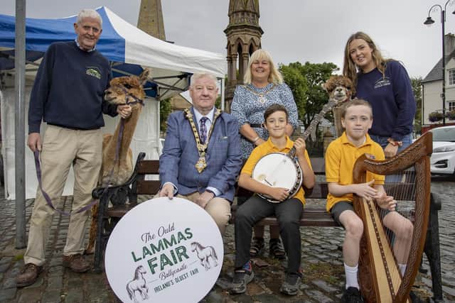Mayor of Causeway Coast and Glens, Councillor Steven Callaghan and Deputy Mayor, Councillor Margaret Anne McKillop pictured with Terence and Mary Clare from Trench Farm, with musicians from Baile an Chaistil Comhaltas at the launch of the Ould Lammas Fair 2023. Credit McAuley Multimedia