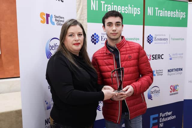 Pictured with Louise Watson, Director of Further Education, Department for the Economy (L) is (R): Josh Mullan who completed a Traineeship in Engineering. Credit Kelvin Boyes