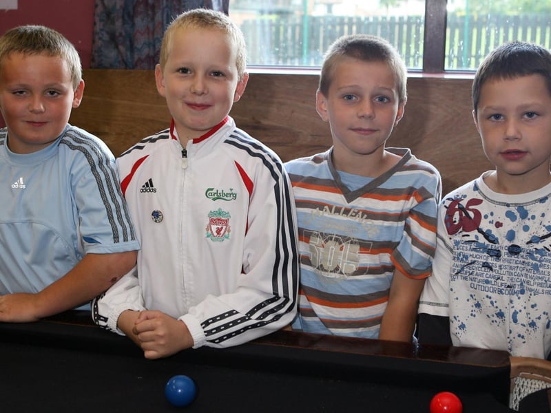 Having fun are Josh Brown, Nathan Blackwood and Steven and Garth Hartley. Ct28-055tc