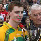 The  late Jim McKeever, a former Derry player from the 1950's, pictured presenting the 'Man of the Match' award to Glenullin's Gerard O'Kane, after the team defeated Bellaghy in the final replay of the County Derry Senior Championship against Bellaghy at Celtic Park.