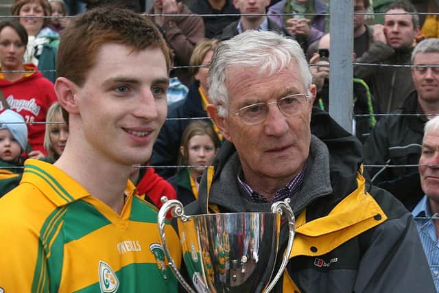 The  late Jim McKeever, a former Derry player from the 1950's, pictured presenting the 'Man of the Match' award to Glenullin's Gerard O'Kane, after the team defeated Bellaghy in the final replay of the County Derry Senior Championship against Bellaghy at Celtic Park.
