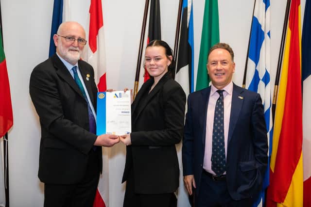Hannah Montgomery receiving her Rotary Youth Leadership Development award from Capt. Sean Fitzgerald, district governor of Rotary Ireland and Patrick O’Riordan, head of public affairs with the European Parliament in Ireland. Photo: Collette Creative Photography.