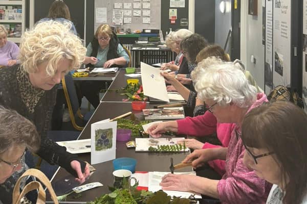 The over 55s Carnlough drop in group had the opportunity to immerse themselves in the world of textiles and Hapa-Zome printing under the guidance of textile artist Angela Turkington of 'Leopard & Lily'.  Photo: Causeway Coast and Glens Heritage Trust