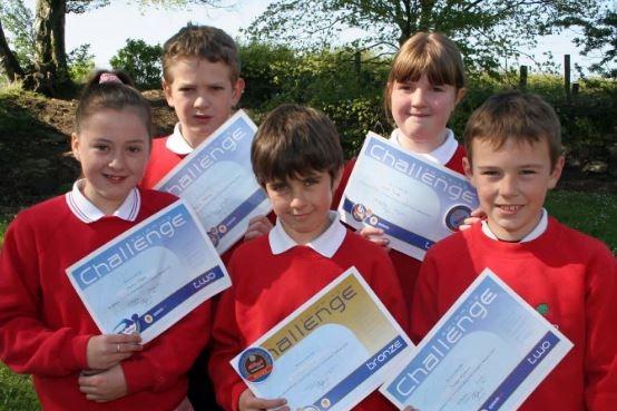 Laureen Logan, Kyle McIlroy, Ryan Burke, Laura Robb and Jordan Gilmour of Straid Primary School all recivied their Challenge 2 Awards for Swimming Challenge after taking part in life saving skills in 2007.