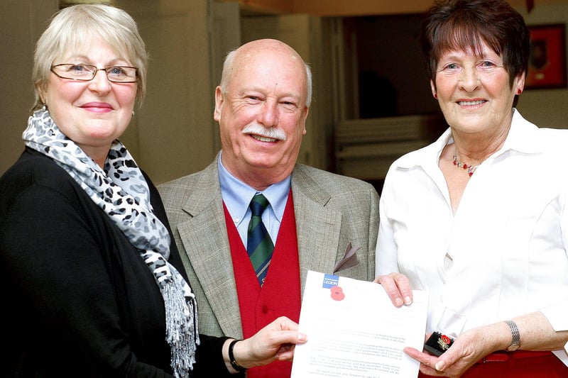 Sue Pinkerton presents a 15 Year Collecting Certificate to Martha Barkley at the Poppy Appeal Dinner held at Ballymoney RBL in 2010