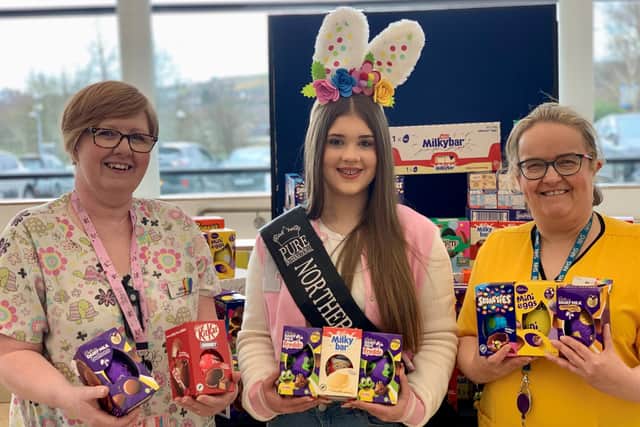Jasmine Parker with South Eastern Trust, Healthcare Play Specialist’s Sharon Pauley and Gillian Sinclair. Pic credit: SEHSCT