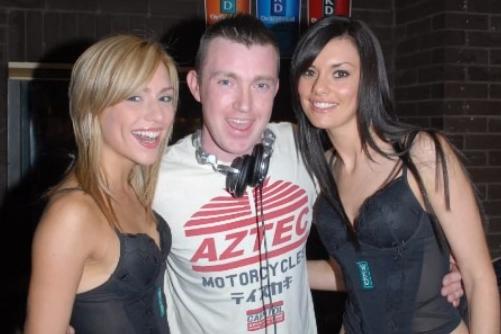 DJ Ciaran Campbell with Jenny and Zara from WKD at the Kiln in 2007. Photo by: Peter Rippon