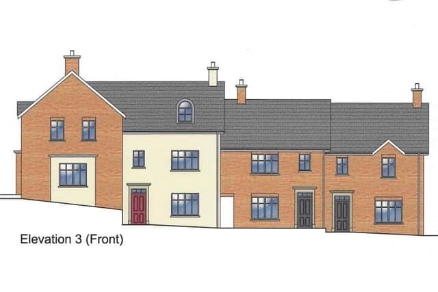 The new dwellings to the rear of 16-50 Donaghmore Road, Dungannon, will be built on a gradient. Credit: Mid Ulster planning portal