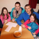 Looking forward to the quiz at Carnew are Gary and Eva Smyth with children Kyle, Annie and Nancy. 