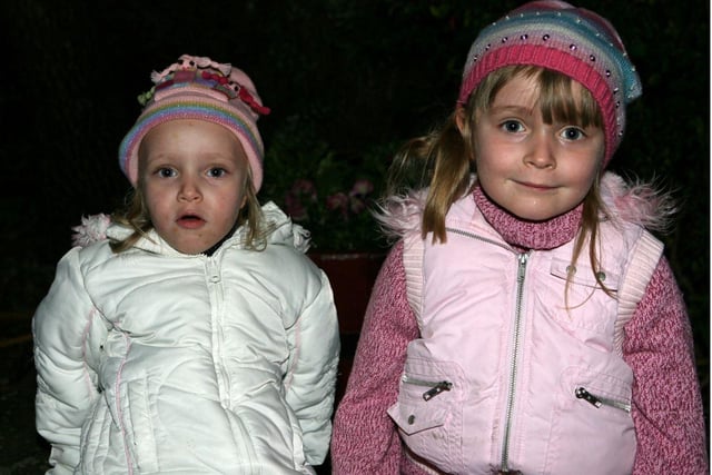 Precious and Annalise Collins wrapped up warm to watch Whitehead's 2007 Christmas lights switch on. Ct49-045tc