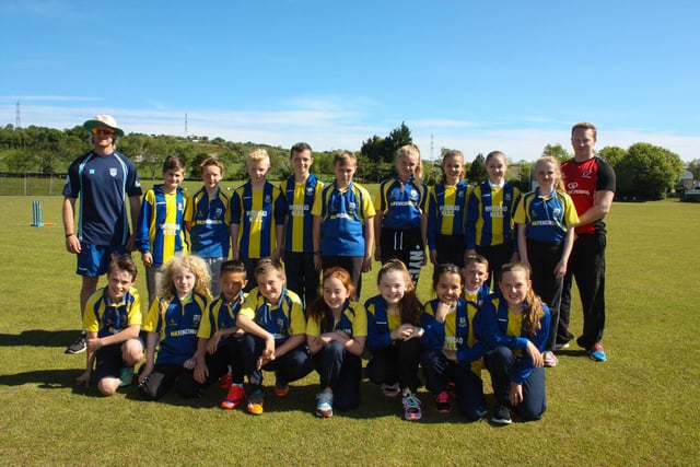 Whitehead Primary School's Cricket team with teacher Neil Hastings and Carrick Cricket club's coach Jamie Holmes at the Schools' 2015 Tournament. INCT 24-004-JC