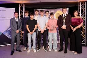 Jonathan McFadden, representative from award sponsor Causeway Healthy Kids, with the Mayor of Causeway Coast and Glens, Councillor Ciarán McQuillan, Denise Watson and Junior Team of the Year winner Dalriada U16 Boys Volleyball Team.