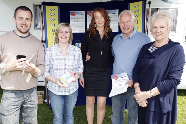 Billy, Isobel and Marty Nutt and Louise Smyth from Nutt Travel pictured with Paula Cassidy during the Ford Fair at the Dunluce Centre in 2009