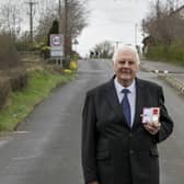 Long-serving Cookstown 100 official Norman Crooks with his British Empire Medal on the Cookstown 100 course last year. Picture: Baylon McCaughey