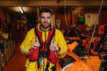 Long-serving lifeguard supervisor on the Causeway Coast Karl O'Neill has passed out as a Coxswain at Portrush RNLI. Credit RNLI