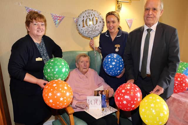Gertrude Mullan celebrates turning 100 with Patricia Deighin, Katrina Canning and Jarvis Nutt at Cornfields Care Centre.