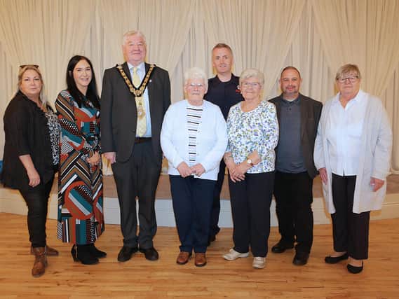 Pictured with the Mayor of Causeway Coast and Glens, Steven Callaghan at Coleraine 50+ Forum’s Info Day and tea dance In Lodge Hotel in Coleraine are (left to right), Patricia McQuillan, Policing and Community Safety Partnership, Tori Calderwood, Manager of COAST, Sally McDonald, Treasurer Coleraine 50+ Forum, John McAuley, Northern Ireland Fire Service, Maud Anderson, Chairperson Coleraine 50+ Forum, Gareth Doran, Housing Executive Good Relations Officer Causeway and Rosemary McCaw, Secretary of Coleraine 50+ Forum. Credit NIHE