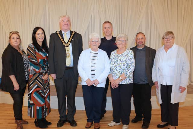 Pictured with the Mayor of Causeway Coast and Glens, Steven Callaghan at Coleraine 50+ Forum’s Info Day and tea dance In Lodge Hotel in Coleraine are (left to right), Patricia McQuillan, Policing and Community Safety Partnership, Tori Calderwood, Manager of COAST, Sally McDonald, Treasurer Coleraine 50+ Forum, John McAuley, Northern Ireland Fire Service, Maud Anderson, Chairperson Coleraine 50+ Forum, Gareth Doran, Housing Executive Good Relations Officer Causeway and Rosemary McCaw, Secretary of Coleraine 50+ Forum. Credit NIHE