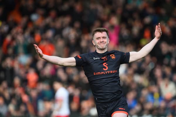 Ross McQuillan celebrates his goal for Armagh against Derry in the league. Pic: John Merry